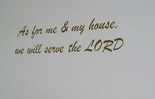 A removable golden matte film that reads, "As for me and my house, we will serve the lord"